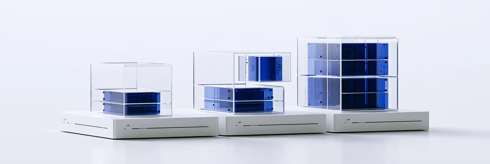 Spatial render: three product cases of growing depth on one shared base